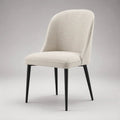 Sedia da pranzo imbottita beige in tessuto con schienale curvo e gambe in acciaio nero, 50 × 57 × 84 cm